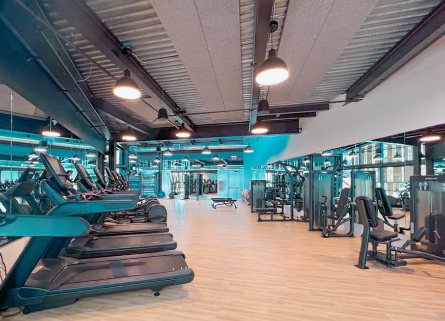 indoor gym with modern equipment at Evemore Orlando Resort