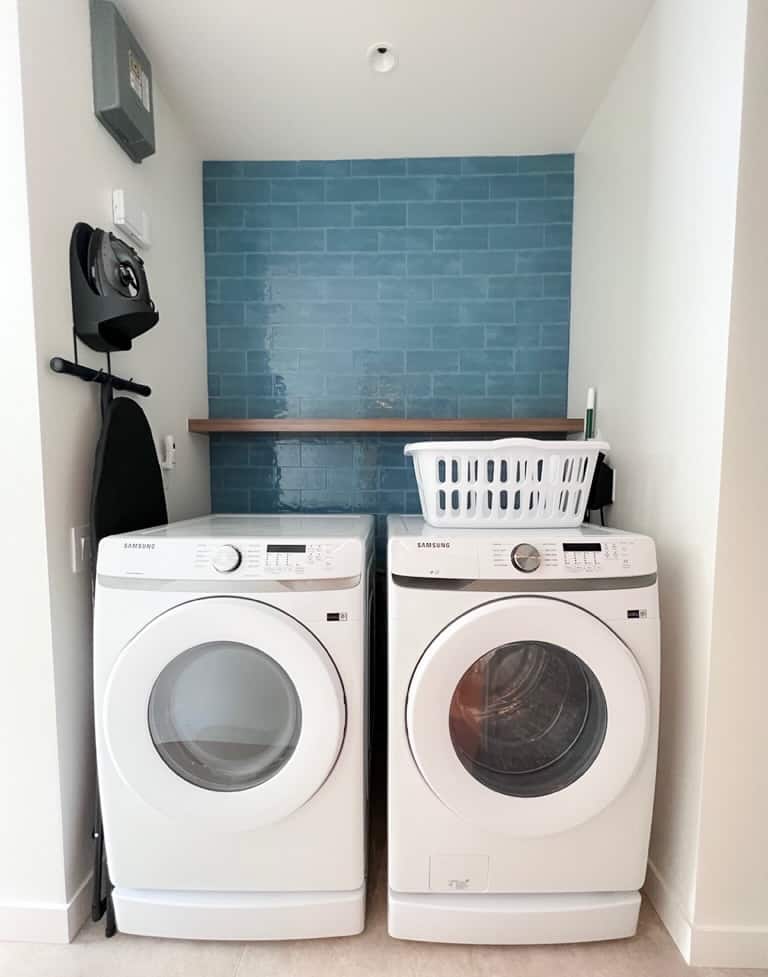 laundry room with washer and dryer at Evemore Orlando Resort