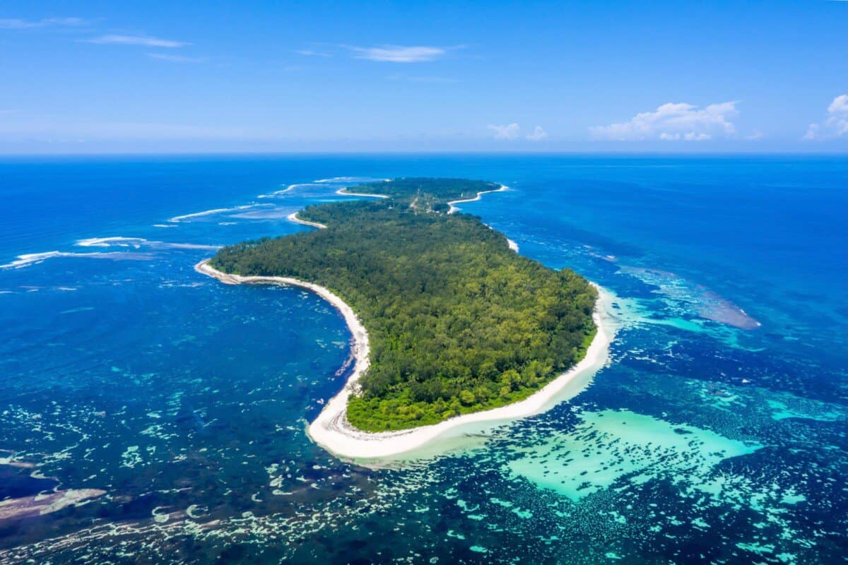 aerial view of island in Seychelles with bright blue waters