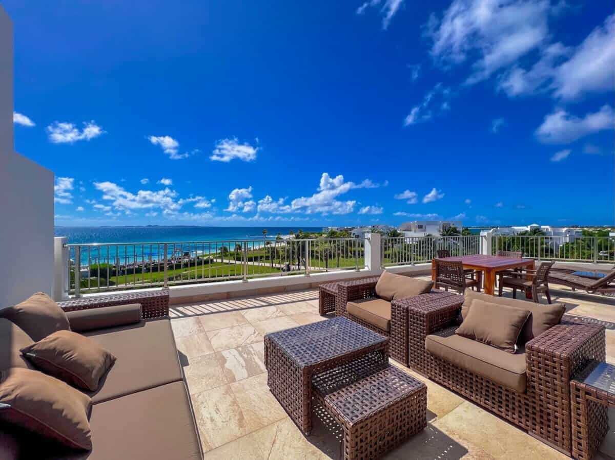 large balcony overlooking the ocean at Aurora Anguilla Resort & Golf Club 