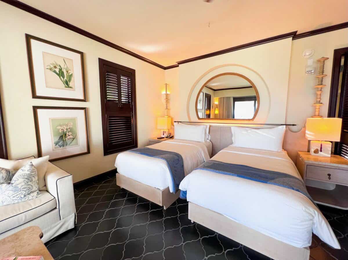 modern hotel room with two beds at Anguilla Cap Juluca