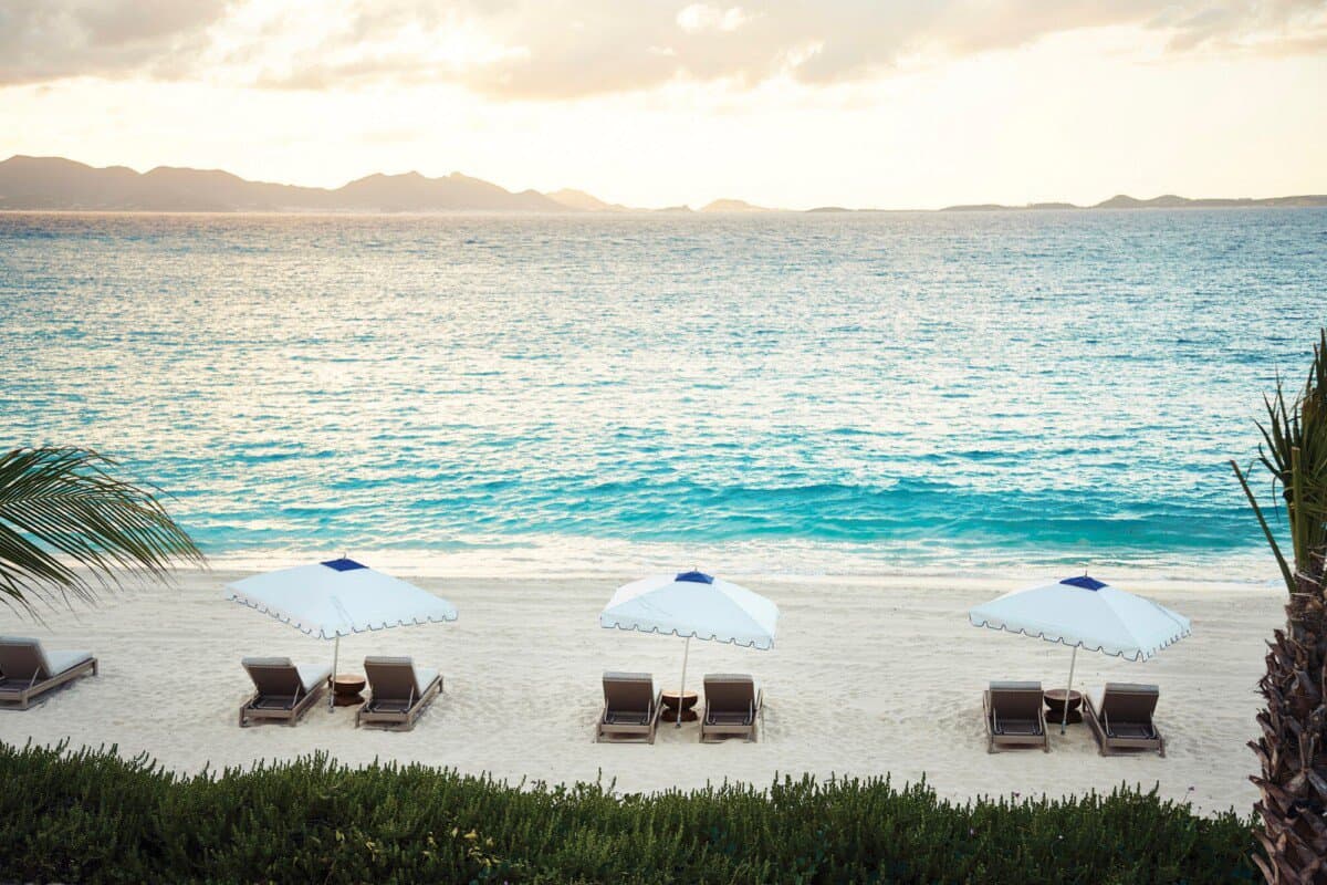 beach chairs set along the white sand beach at Anguilla Cap Juluca