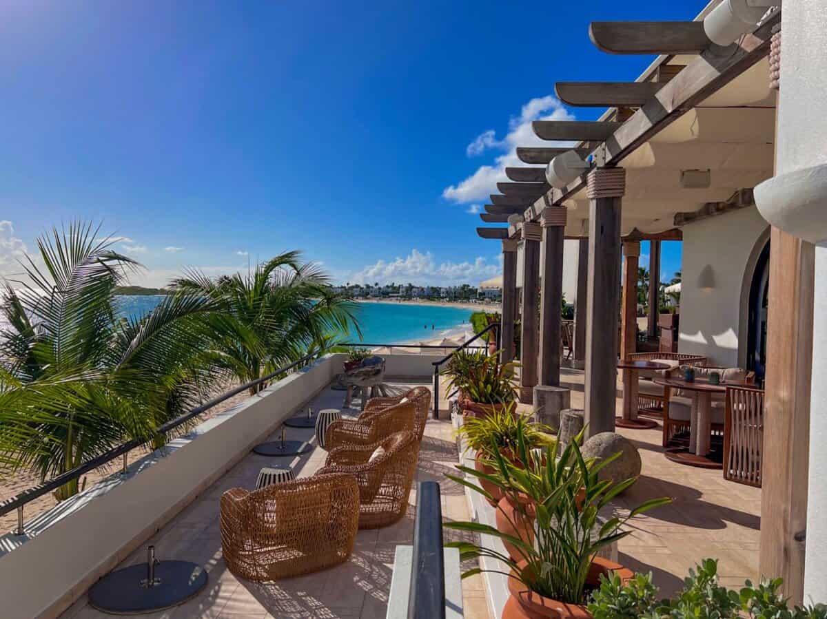 outdoor seating area overlooking the ocean at Anguilla Cap Juluca